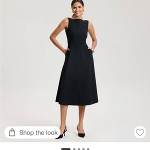 Elegant Black Sleeveless Dress with pockets